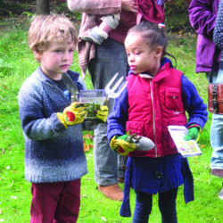 Sowing wildflower seeds at Children's meeting