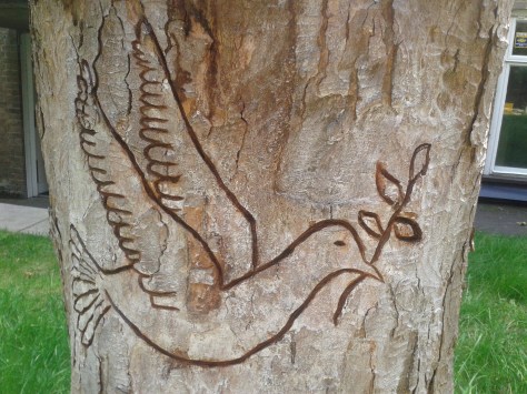 Nottinghamquakers.org.uk image: Peace pole in Nottingham Friends Meeting House garden